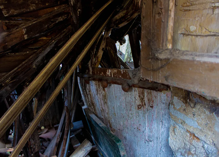 Collapsed interior roof beams, close-up